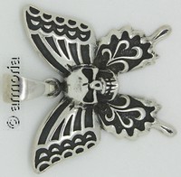 Pendentif Crâne sur Papillon en argent