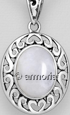 Pendentif aux spirales en argent orné d'une pierre de lune